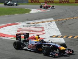 Sebastian Vettel en su monoplaza, durante la competición en el circuito de Monza. AFP  /