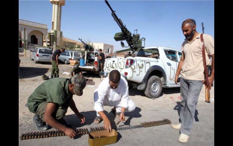 Los rebeldes pretenden ingresar a Sirte de forma pacífica para evitar más derramamientos de sangre. EFE  /