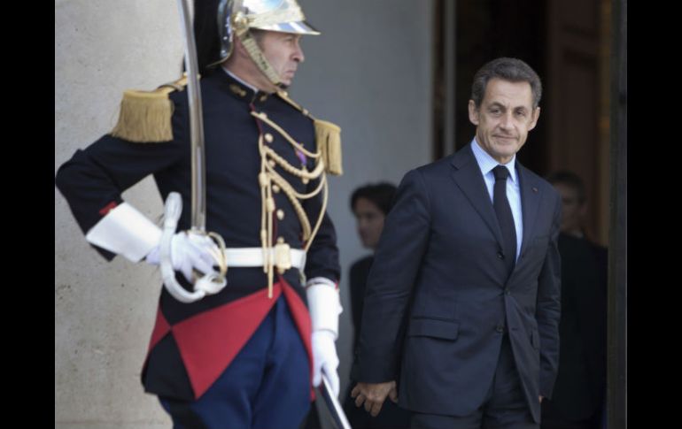 Sarkozy anunció que viajaría a Libia cuando el CNT se instalara en la capital Trípoli. AP  /