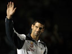 Djokovic abandona el duelo ante Nalbandian por un problema en la espalda. AP  /