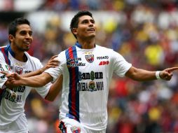 Oscar Rojas (I) y Osvaldo Martinez de Atlante celebra el gol, durante juego de la semana 8 del Apertura 2011. MEXSPORT  /