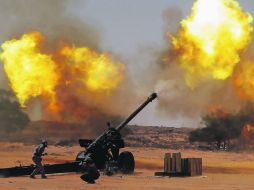 Enfrentamientos entre fuerzas del nuevo orden gubernamental de Libia y los leales a Gadhafi, en la ciudad de Sirte. REUTERS  /