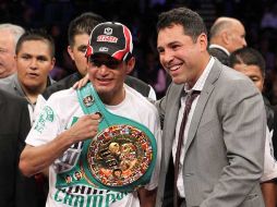 Erik Morales logra su cuarto título mundial en el boxeo. AP  /