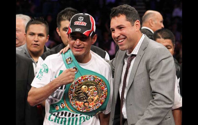 Erik Morales logra su cuarto título mundial en el boxeo. AP  /