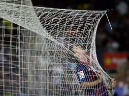 Lionel Messi se despachó con un triplete en la feria de goles del Barcelona al Osasuna en el Camp Nou. AP  /