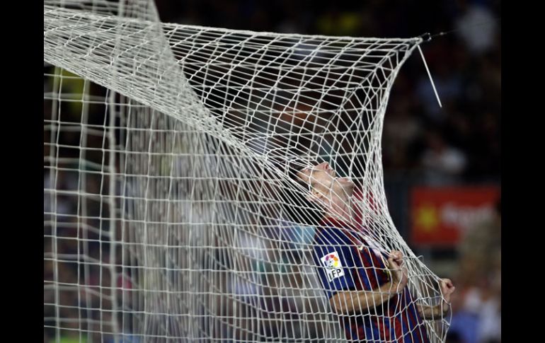 Lionel Messi se despachó con un triplete en la feria de goles del Barcelona al Osasuna en el Camp Nou. AP  /