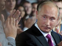 Al postularse Putin puso fin a meses de conjeturas. AP  /