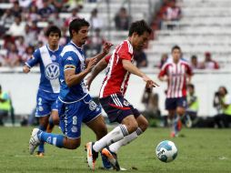 A pesar de esta situación, está consciente de que Torres aún 'tiene cosas que mejorar' en la cancha. MEXSPORT  /