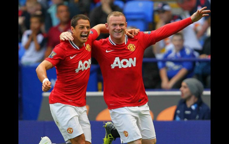 Los goleadores ''Chicharito'' (i) y Rooney se recuperaron de sus lesiones. MEXSPORT  /