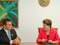 El presidente de la alianza RenaultNissan en un encuentro con Dilma Rouseff. EFE  /