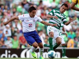 A pesar de la derrota ante Santos, el técnico de Cruz Azul cree que su equipo va por buen camino. AFP  /