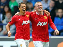 En la imagen aparece Javier 'Chicharito' Hernández y Wayne Rooney. MEXSPORT  /