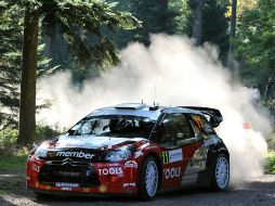 Petter Solberg y su copiloto, Chris Gran Bretaña de Patterson cerca de Plaine. AFP  /