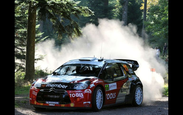 Petter Solberg y su copiloto, Chris Gran Bretaña de Patterson cerca de Plaine. AFP  /