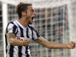 Claudio Marchisio celebra con emoción el triunfo de último minuto. AP  /