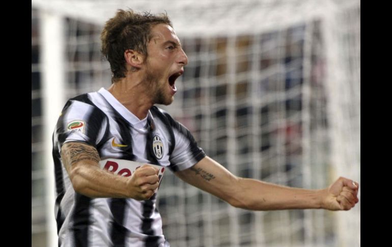 Claudio Marchisio celebra con emoción el triunfo de último minuto. AP  /