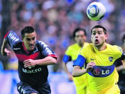 Una jugada de Juan Román Riquelme devino en el gol que le dio el triunfo a su equipo, el Boca Juniors. AP  /