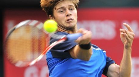 El tenista estadounidense Mardy Fish resistió un duro encuentro ante su compatriota Ryan Harrison. AFP  /