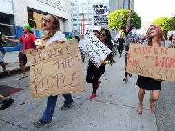 Los inconformes en contra de Wall Street protestaron contra los bancos de la Reserva Federal. AFP  /