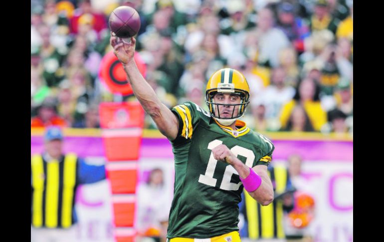 Si Atlanta quiere ganar será clave frenar a Aaron Rodgers, mariscal de campo de Green Bay (foto). AP  /