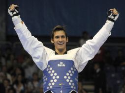 Sebastián Crismanich celebra después de su triunfo ante el venezolano Carlos Vázquez. EFE  /