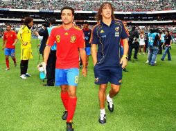 Xavi Hernandez  y Carles Puyol durante un juego amistoso en el estadio Azteca.MEXSPORT  /