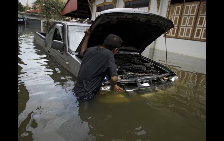 Los daños por las inundaciones ascienden a 190 mil millones de baht. AFP  /