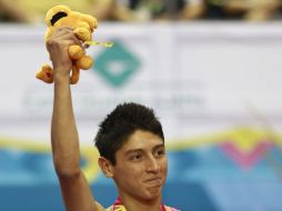 José Alberto Vargas festeja haber conseguido la primera medalla en el trampolín de los Panamericanos. AP  /