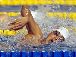 La atleta durante la competencia 4x100. MEXSPORT  /