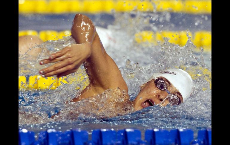 La atleta durante la competencia 4x100. MEXSPORT  /