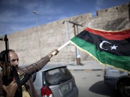 Combatientes celebran la caída de la ciudad natal de Muamar Gadhafi, Sirte. REUTERS  /