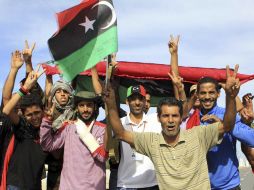 Las celebraciones por la caída de la ciudad de Sirte y la muerte del dirigente libio Muamar Gadhafi. EFE  /