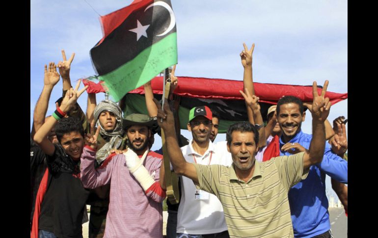 Las celebraciones por la caída de la ciudad de Sirte y la muerte del dirigente libio Muamar Gadhafi. EFE  /