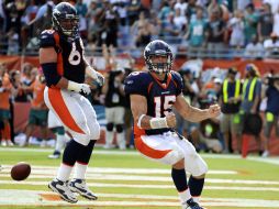 el jugador de Broncos Tim Tebow (15) celebra el marcador final de su encuentro. REUTERS  /