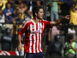 Antonio Gallardo festeja uno de los goles que anotó Chivas a América el dia de ayer en el Clásico. AP  /