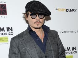 Depp asiste a la premiere de 'The Rum Diary' en el Museo de Arte Moderno. AP  /