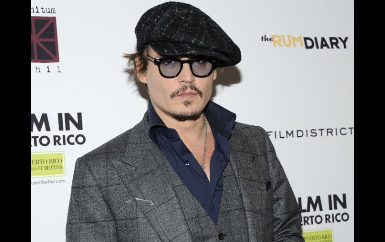 Depp asiste a la premiere de 'The Rum Diary' en el Museo de Arte Moderno. AP  /