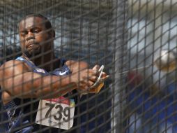 Johnson, durante la competencia en donde se llevó el oro y el récord. AP  /