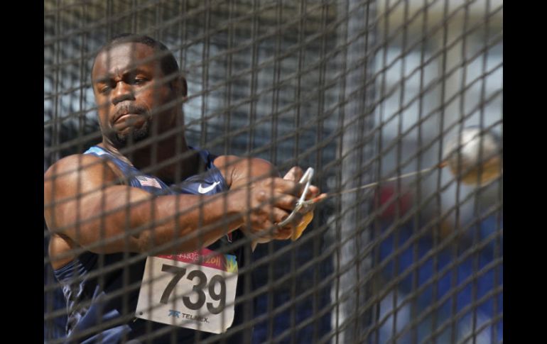 Johnson, durante la competencia en donde se llevó el oro y el récord. AP  /