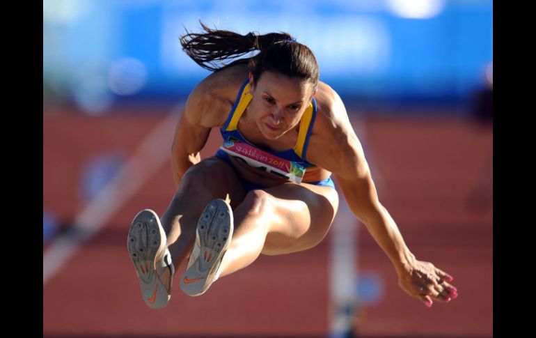 La atleta ya lleva tres oros. AP  /