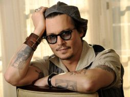 Además de Depp, la cinta cuenta con la participación de Aaron Eckhart (El caballero de la noche) Y Amber Heard (Zombieland). AP  /