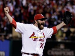 Jason Motte celebra la victoria de su equipo sobre los Rangers. AP  /