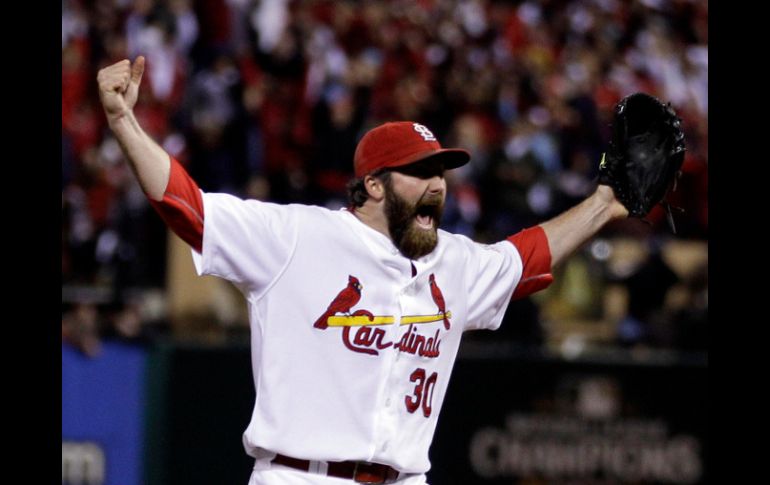 Jason Motte celebra la victoria de su equipo sobre los Rangers. AP  /