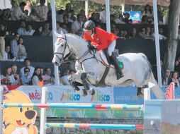 Los binomios estadounidenses hacen el uno-dos en el salto individual ecuestre y Brasil se queda con el bronce.  /