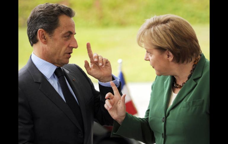 Sarkozy y Merkel han acordado una reunión para el miércoles por la tarde en Cannes. AFP  /