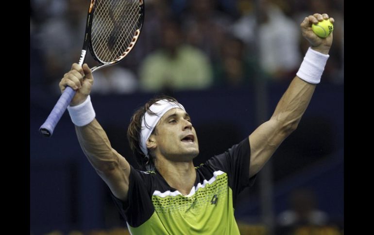 David Ferrer festeja su triunfo ante Fernando Verdasco en la primera ronda del Valencia Open 500. EFE  /