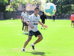 Los rojinegros en prácticas, previo al encuentro contra Santos.  /