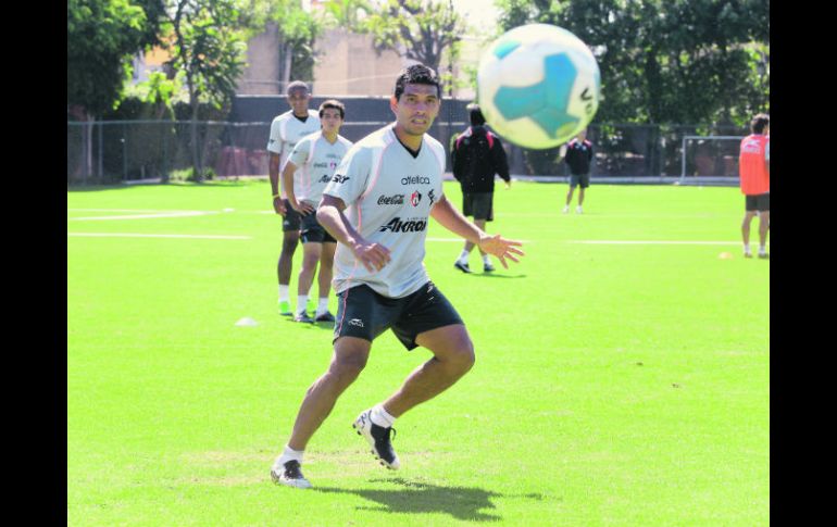 Los rojinegros en prácticas, previo al encuentro contra Santos.  /