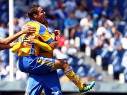 Jesús Dueñas celebra el gol que le dio el triunfo a los Tigres. MEXSPORT  /