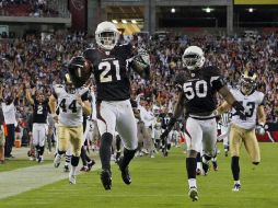 Peterson celebra la anotación con la que ganaron los Cardenales. AP  /